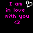Pixelated text reads "I am in love with you <3" in bright pink on black, with a white heart symbol replacing the word "love" in the first frame.