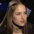 A pixelated image of a person with long brown hair and a black choker, next to green text reading 'Original Icons .com' on a dark background.