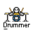 Pixel art drumming character with yellow torso, blue drums, and brown sticks; text "Drummer" below on gray background.