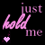 Pixelated text 'just hold me' in pink script with a heart symbol below, displayed on black background.