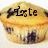 A single blueberry muffin with a golden-brown top and visible blueberries, featuring changing text overlays across frames.