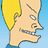 Pixelated cartoon character head with yellow hair, blue shirt collar, and light skin against a solid light blue background.