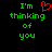 Green pixelated text reads "I'm thinking of you" with a red heart symbol replacing the 'o' in 'you', displayed on black background.