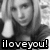 Black-and-white pixelated image of a person with long hair, wearing a dark top, with text 'iloveyou!' at the bottom left.