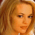 Pixelated image of a person with light brown hair against dark green background, featuring bright green text reading 'Original Icons .com'