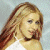 A pixelated contact sheet showing two frames of an animated icon featuring a woman with long brown hair on the left and green text reading "Original Icons .com" on a dark green background on the right.