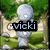Pixelated image of a stone statue with green foliage background, featuring text overlays in different colors and styles across four