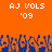 Pixelated orange background with white text 'AJ VOLS '09' repeated twice above a blue and orange crowd of raised hands.