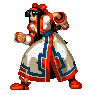 Pixel art character in traditional East Asian attire with red, white, and blue patterns performing a fighting stance