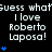 Animated text repeats 'Guess what I love Roberto Laposas!' with blue heart symbols appearing and disappearing in sequence across three on a black background
