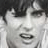 Black-and-white animated sequence of a person's face repeating with text overlay reading 'THE ALL-THE ALL-AMERICAN REJECTS' in pixelated font.