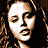 A 2x2 contact sheet of four pixelated celebrity-style portraits with visible text "Coolbuddy.com" on the right side, each frame showing a different woman's face in low-resolution digital art style.