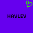 Green pixelated heart symbol above two black 'HAYLEY' text blocks on solid purple background.