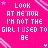 Pixelated pink background with repeated text 'LOOK AT ME NOW I'M NOT THE GIRL I USED TO BE' and scattered star/slash graphics.