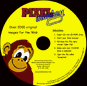 Yellow circular disc with central hole, featuring a cartoon monkey head in maroon and tan on the left side, red "PEELO" text at top right, blue stylized logo below it, small black dots scattered across surface.