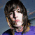 six distinct visual showing a person with long brown hair in various poses and backgrounds, including stage lighting and text overlays