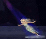 Animated sequence of a blonde woman in a light blue dress performing a dance routine under purple stage lights.