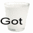 Two side-by-side animated frames of a white milk glass with text, showing sequential changes in visible text content.