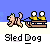 Pixel art animation of a dog pulling a sled with two figures, set against a blue sky with clouds.