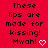 Red background with black pixelated text reading 'These lips are made for kissing! Mwah!' and a white heart symbol.
