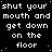 Black background with repeated white pixelated text 'shut your mouth and get down on the floor' and scattered pink dots, with a solid gray rectangle in the bottom-right corner.