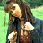 A 48x48 pixel animated buddy icon featuring a woman in motion on the left and "Johnson Family Vacation" text on a green background on the right, displayed as a contact sheet with two frames.