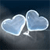 Two light blue heart shapes with white outlines overlap on a dark gradient background, rendered in pixelated style.