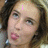 A four- shows a person with brown hair and light skin making a pouty expression, with pink text overlays changing