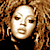 A 2x2 contact sheet of a pixelated animated icon featuring two identical frames of a woman with curly hair and one frame showing text on a blue background, all in low-resolution pixel art style.