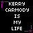 Pixelated text reads 'KERRY CARMODY IS MY LIFE' in white on black background with pink star and dot accents.