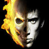 A static image of a human face split vertically, with the left side engulfed in orange-yellow flames and the right side showing a pale, serious expression against a black background.