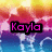 Pixelated image with vibrant gradient background transitioning from yellow to pink and blue, featuring the text 'Kayla' in bold magenta letters on a black rectangle.