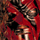 Pixelated static image of abstract red and brown shapes with black voids on a dark background, resembling an indistinct cartoon or stylized character fragment.