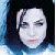 Four pixelated headshots arranged in a , each with distinct facial features and hair colors against light blue backgrounds