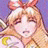 A 48x48 pixel animated buddy icon featuring a cartoon character with blonde hair and pink bow on the left, paired with "Anime IM" text logo on black background to the right.