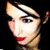 Two side-by-side images of a woman with dark hair and red lipstick on a black background with white text reading 'lyn-z's a mommy baby way. gerard's a daddy coming summer of '09 ♡'