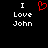 Black background with white pixelated text 'I Love John' on both sides and a red pixelated heart symbol between them.
