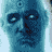 Blue-skinned figure with a third eye on forehead, holding a knife and hammer against a yellow background with red splatters.