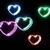 Five heart-shaped icons with glowing outlines in blue, green, purple, teal, and pink hues against a black background.