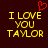 Dark brown background with yellow pixelated text reading "I LOVE YOU TAYLOR" and a red pixelated heart above the text on the left side.