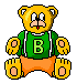 Pixelated yellow teddy bear wearing green sweater with large B, orange pants, and red tongue sticking out against gray background.
