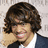 A pixelated image of a person with brown hair and dark clothing against a pink background, accompanied by text reading "Sanjaya Malakar is my sexy ass Indian hubby 4ever".