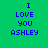 Blue pixelated text reads "I LOVE YOU ASHLEY" on a green gradient background with one frame showing a yellow glow effect.