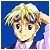 Pixelated anime-style character with blonde hair, blue eyes, and a neutral expression against solid blue background wearing light purple shirt over dark blue garment.