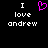 Black background with white pixelated text 'I love andrew' on both sides of a pink heart symbol.
