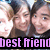 Two people with dark hair pose closely together, one holding a white star-shaped object, with pink text reading 'best friend' at the bottom.