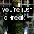 Pixelated image of a character behind bars with overlaid text reading "you're just a freak... like me" and red text at bottom.
