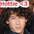 A pixelated image of a person with curly brown hair wearing dark clothing, featuring red text reading "Hottie <3" in the top-left corner.