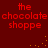 Red pixelated text 'the chocolate shoppe' repeated four times on a dark red background with scattered yellow dots.
