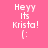 Pink background with white pixelated text reading 'Heyy Its Krista!' and a smiley face in four identical arranged in a
